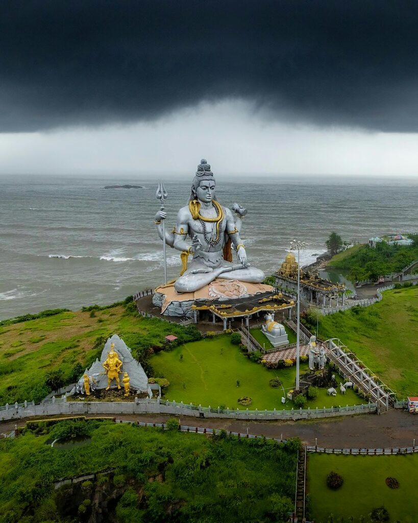 pexels photo 18578652 18578652 A breathtaking aerial view of the Shiva statue at Murdeshwar with stormy skies over the Arabian Sea.